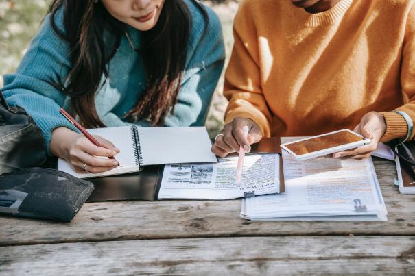 Students with printed texts